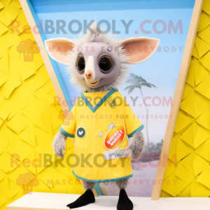 Lemon Yellow Aye-Aye mascot costume character dressed with a Swimwear and Lapel pins