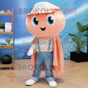 Peach Jellyfish mascot costume character dressed with a Denim Shirt and Shawl pins