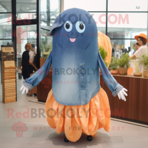 Peach Jellyfish mascot costume character dressed with a Denim Shirt and Shawl pins