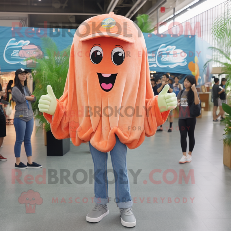 Peach Jellyfish mascot costume character dressed with a Denim Shirt and Shawl pins Peach Jellyfish mascot costume character dressed with a Denim Shirt and Shawl pins