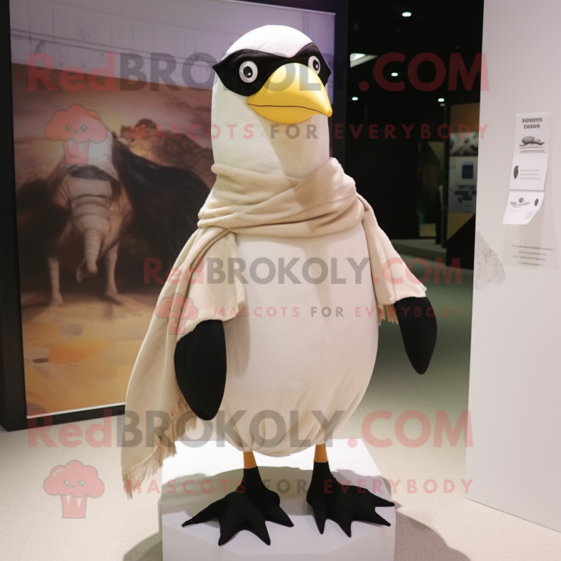 Cream Blackbird mascot costume character dressed with a Shorts and Scarf clips Cream Blackbird mascot costume character dressed with a Shorts and Scarf clips