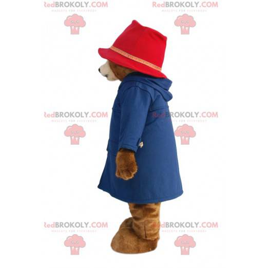 Medvěd maskot s modrým kabátem a růžovým kloboukem -