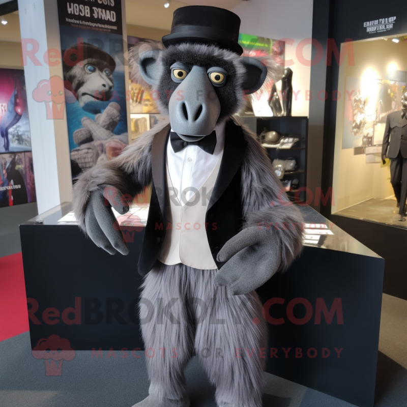 Silver Baboon mascot costume character dressed with a Tuxedo and Scarf clips Silver Baboon mascot costume character dressed with a Tuxedo and Scarf clips
