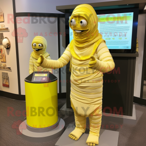 Lemon Yellow Mummy mascot costume character dressed with a Empire Waist Dress and Keychains