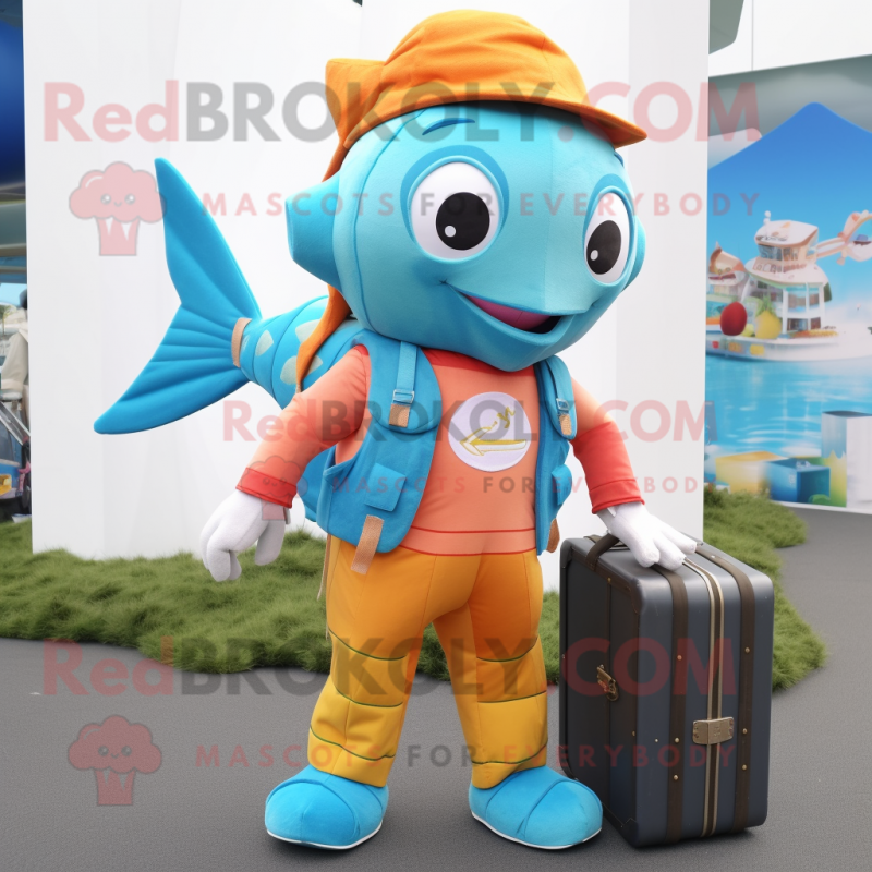 Turquoise Goldfish mascot costume character dressed with a Dungarees and Briefcases Turquoise Goldfish mascot costume character dressed with a Dungarees and Briefcases