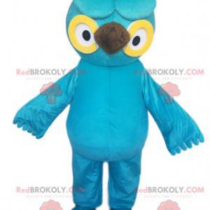 Mascotte gufo blu turchese con bellissimi occhi gialli -