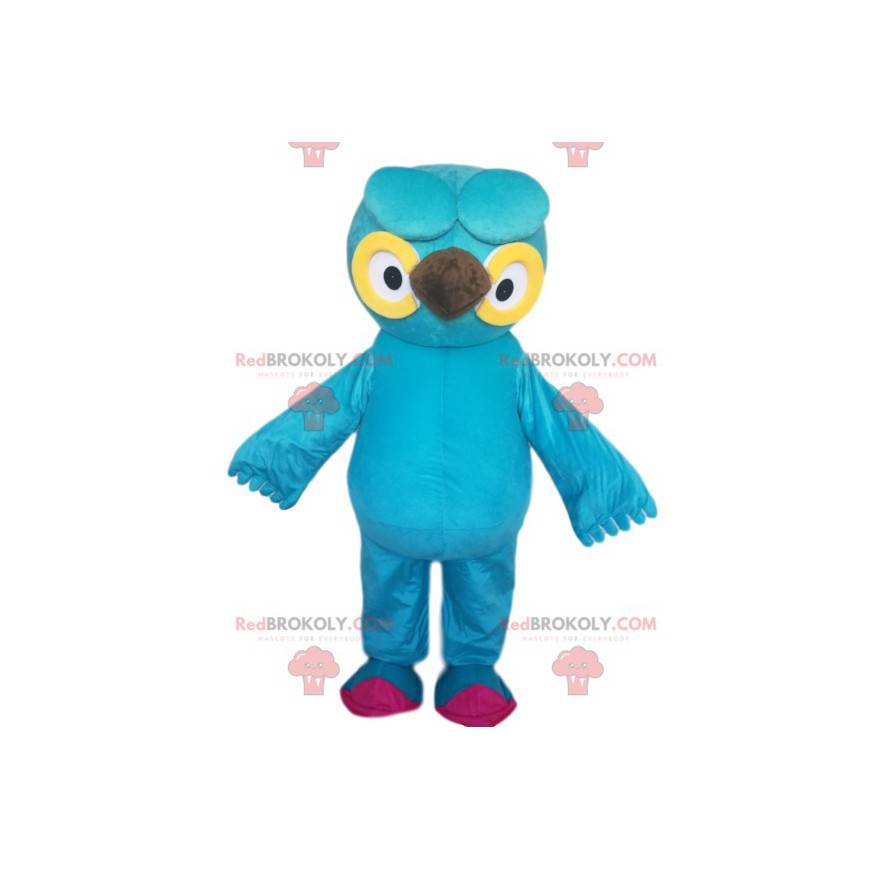 Turquoise blue owl mascot with beautiful yellow eyes -