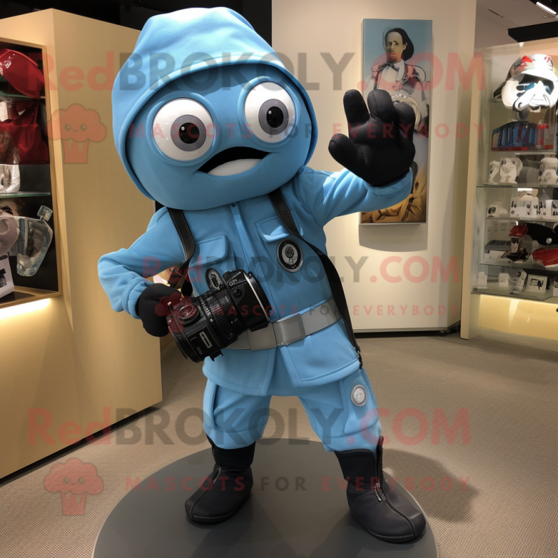 Sky Blue Camera mascot costume character dressed with a Moto Jacket and Shoe clips