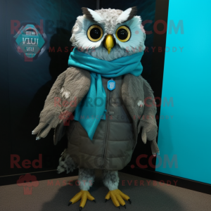 Turquoise Owl mascot costume character dressed with a Leather Jacket and Scarf clips