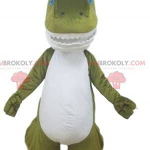Mascote dinossauro verde e branco com dentes bonitos -