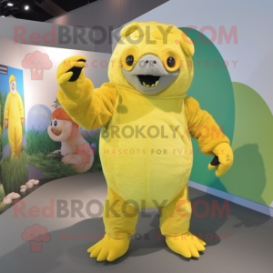 Lemon Yellow Glyptodon mascot costume character dressed with a Jumpsuit and Mittens