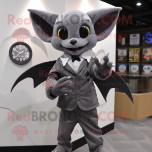 Gray Bat mascot costume character dressed with a Suit Pants and Digital watches