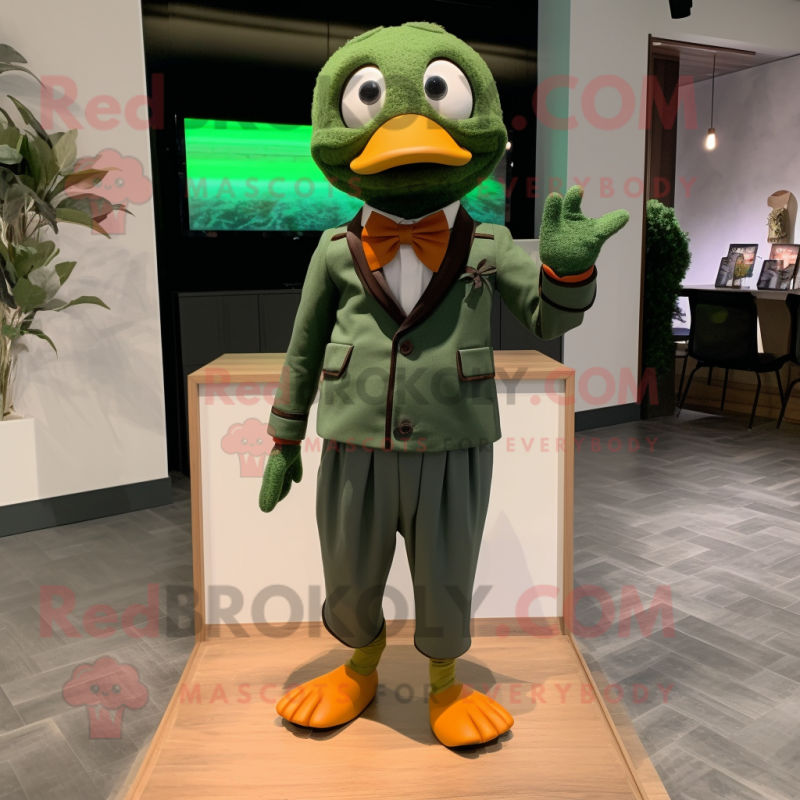 Forest Green Mandarin mascot costume character dressed with a Chinos and Bow ties Forest Green Mandarin mascot costume character dressed with a Chinos and Bow ties