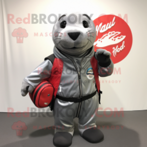 Gray Seal mascot costume character dressed with a Moto Jacket and Backpacks