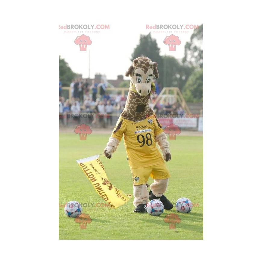 Mascote girafa em roupa esportiva amarela - Redbrokoly.com