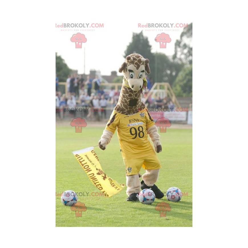 Maskot žirafa ve žlutém sportovním oblečení - Redbrokoly.com Maskot žirafa ve žlutém sportovním oblečení - Redbrokoly.com