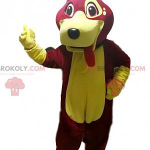 Fuchsia and yellow dog mascot sticking out its tongue -