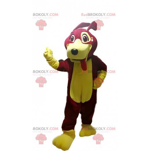 Fuchsia and yellow dog mascot sticking out its tongue -