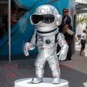 Silver Astronaut mascot costume character dressed with a Romper and Sunglasses