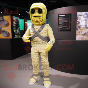 Lemon Yellow Mummy mascot costume character dressed with a Cargo Pants and Bracelet watches