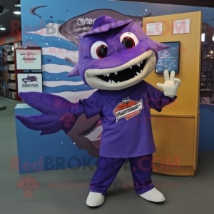 Purple Barracuda mascot costume character dressed with a Henley Shirt and Clutch bags