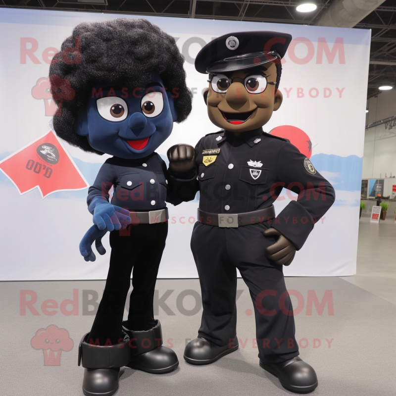 Black Commando mascot costume character dressed with a Mom Jeans and Tie pins Black Commando mascot costume character dressed with a Mom Jeans and Tie pins