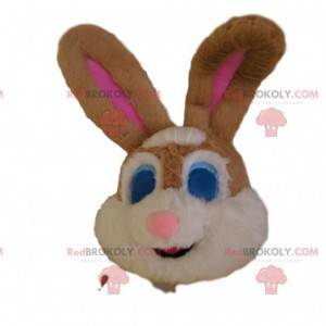 Tête de mascotte de lapin marron et blanc, avec des yeux bleus