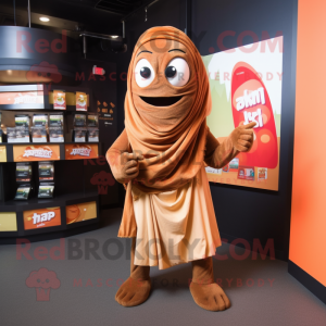 Brown Tikka Masala mascot costume character dressed with a Wrap Skirt and Scarves