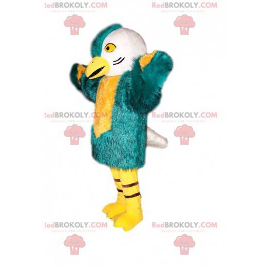 Mascote pássaro com uma bela plumagem azul verde e branca -