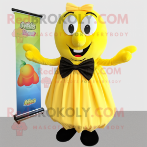 Yellow Mango mascot costume character dressed with a Pleated Skirt and Bow ties