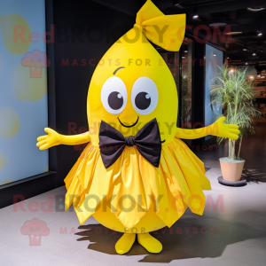 Yellow Mango mascot costume character dressed with a Pleated Skirt and Bow ties