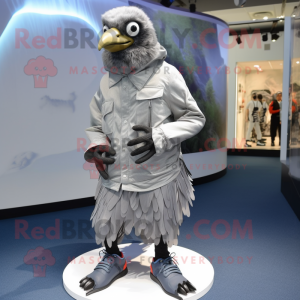 Silver Crow mascot costume character dressed with a Parka and Shoe laces