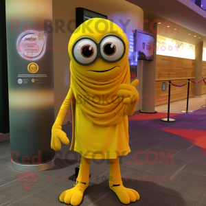 Yellow Cyclops mascot costume character dressed with a Cover-up and Scarves