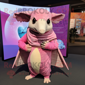 Pink Armadillo mascot costume character dressed with a Cover-up and Shawls