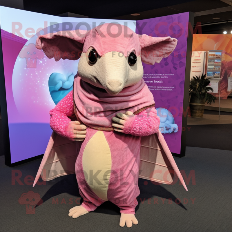 Pink Armadillo mascot costume character dressed with a Cover-up and Shawls Pink Armadillo mascot costume character dressed with a Cover-up and Shawls