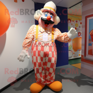 Peach Clown mascot costume character dressed with a Overalls and Cufflinks