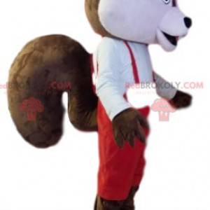 Mascote esquilo marrom e branco com macacão vermelho -