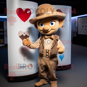 Tan Cupid mascot costume character dressed with a Waistcoat and Hat pins
