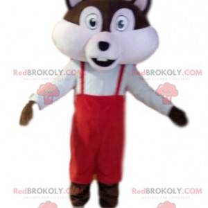 Brown and white squirrel mascot with red overalls -