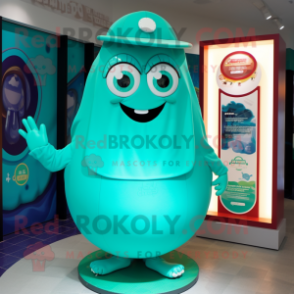 Turquoise Candy Box mascot costume character dressed with a Cover-up and Rings