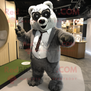 Silver Spectacled Bear mascot costume character dressed with a Suit and Ties