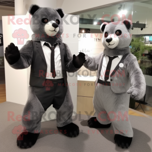 Silver Spectacled Bear mascot costume character dressed with a Suit and Ties