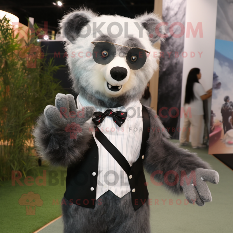 Silver Spectacled Bear mascot costume character dressed with a Suit and Ties