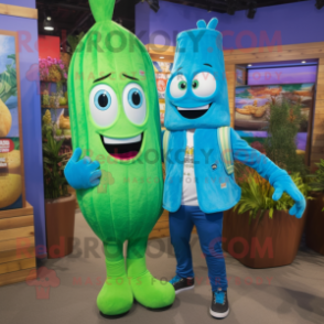 Turquoise Asparagus mascot costume character dressed with a Boyfriend Jeans and Backpacks