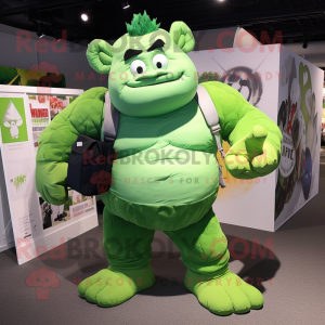 Green Strongman mascot costume character dressed with a Romper and Messenger bags