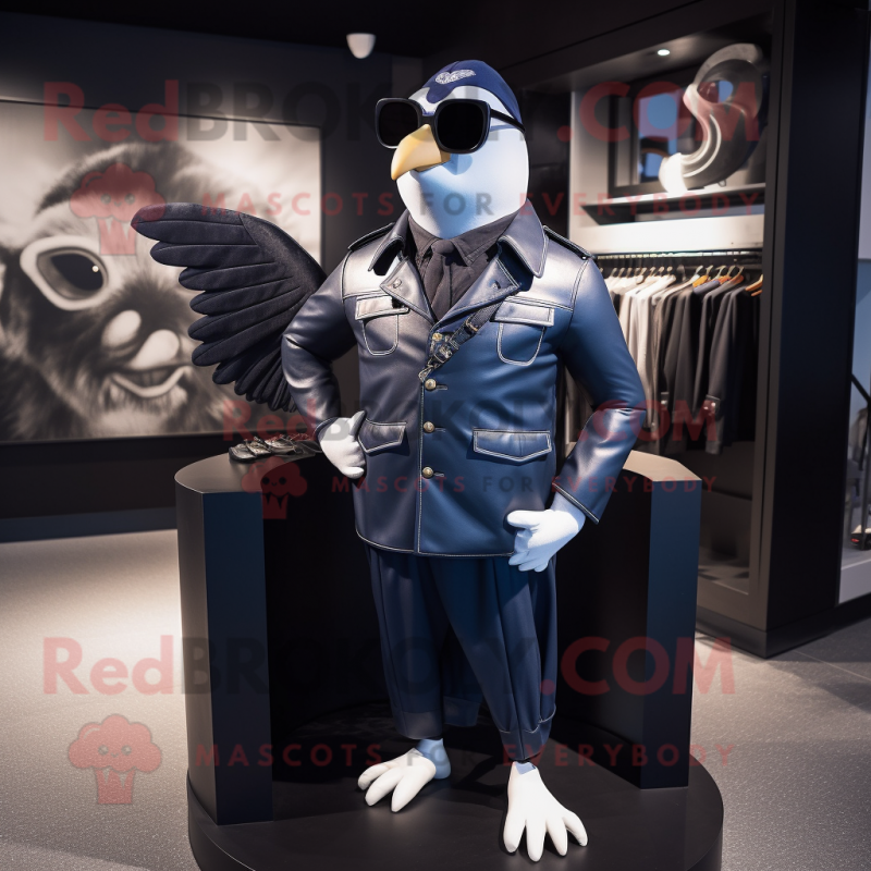 Navy Pigeon mascot costume character dressed with a Biker Jacket and Briefcases