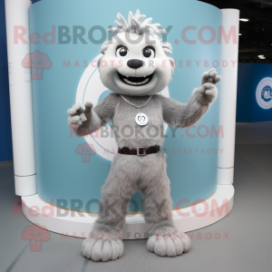 Silver Bracelet mascot costume character dressed with a Chinos and Rings