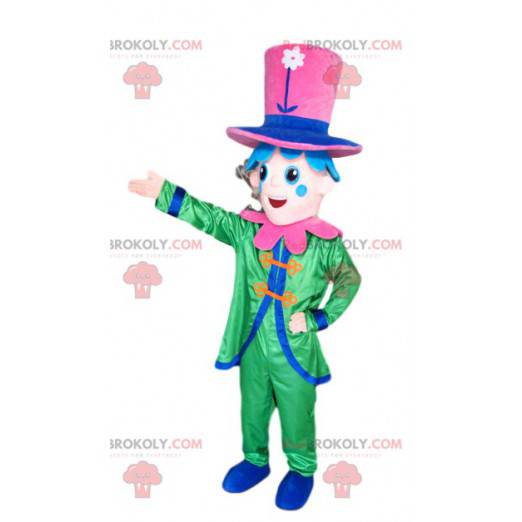 Smiling character mascot with a green costume and a pink hat -