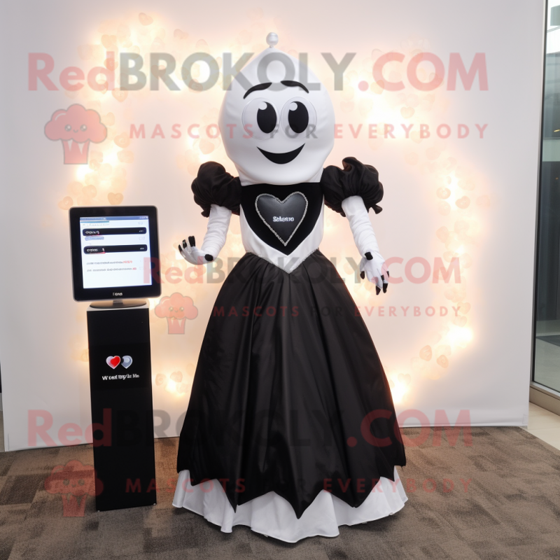 Black Heart mascot costume character dressed with a Wedding Dress and Digital watches