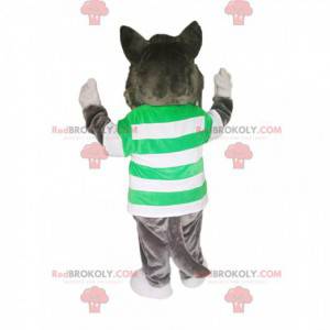 Mascota lobo gris con un jersey de rayas verdes y blancas -